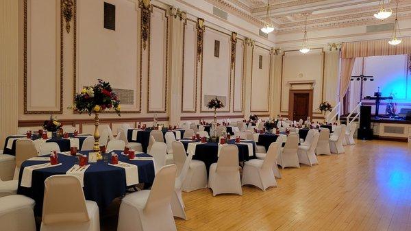 The Grand Ballroom opens up to two-story tall columns which draw your eye to the ceiling with festive plaster relief details.