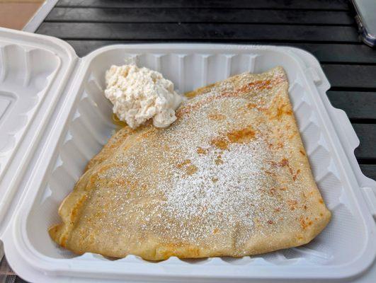 Lily's lemon crepe with fresh whipped cream and powdered sugar