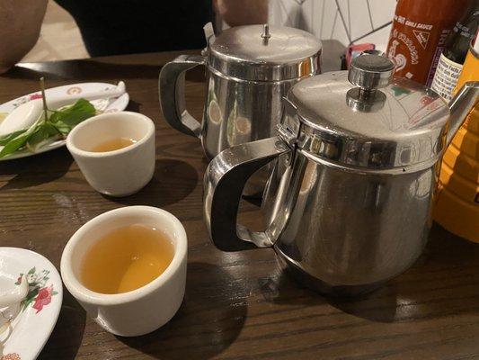 Tea for two people, two full sized pots . You might need to clarify one pot of tea, two cups.