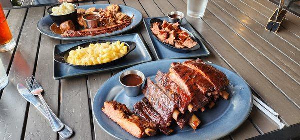 Ribs, burnt ends, brisket, sausage and pulled pork. Sides were potato salad and mac and cheese.