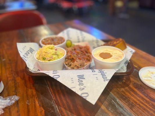 Pulled pork, baked beans, potato salad, banana pudding