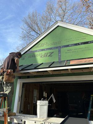 Metal roof installation in progress