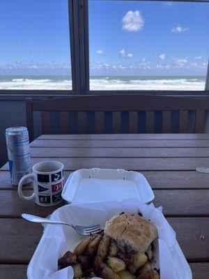 Breakfast sandwich biscuit and potatoes