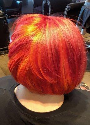 Fire Hair, using 5 different colors, by our stylist Aegis Vaughn.