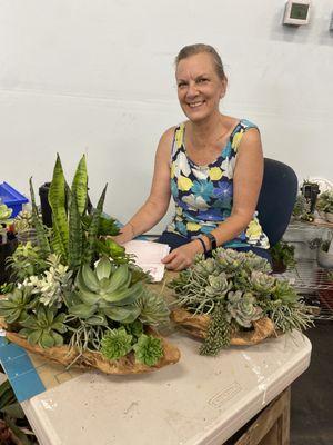 Rhonda at work creating custom succulent arrangements.