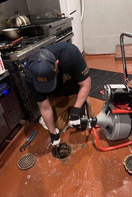 Snaking a floor drain at a local restaurant.