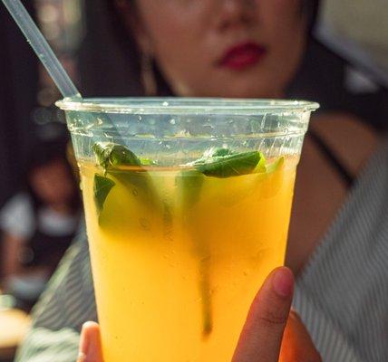 House-made Orange Brown Lemonade w/ Basil leaves infused.