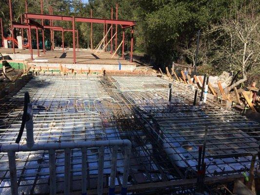 Radiant heating pipe installation on a preconstruction home