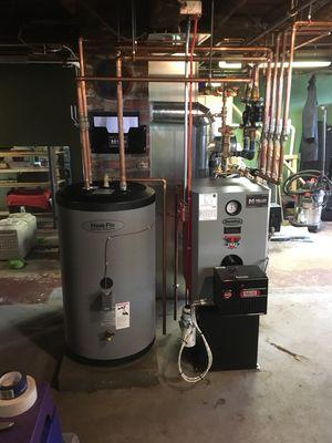 Pure Pro Trio triple pass oil fired hot water boiler with Heat Flo 40 gallon indirect water heat.