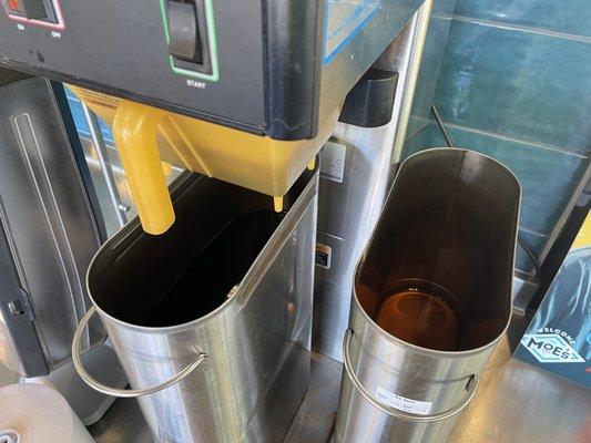 Empty, exposed tea urns