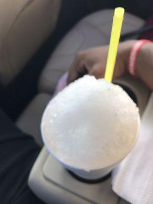 Jumbo coconut snocone with 2 scoops of vanilla ice cream. Heaven!!