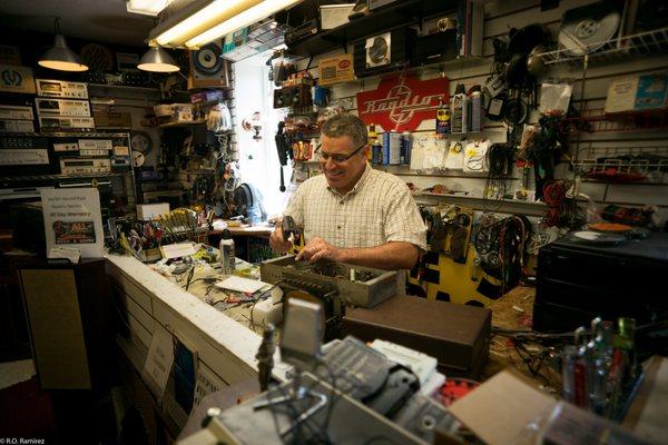 Mike Papa working his magic on a vintage tube radio.