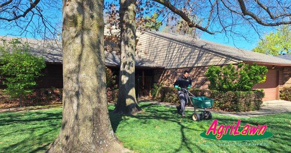 Fertilizing for a healthier, greener lawn! Our team is dedicated to giving your lawn the nutrients it needs to thrive.