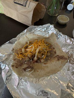 $8 for two of these tacos because she didn't wanna sub the egg for potatoes, or charge me a normal add on