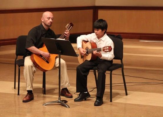 Mr. John performs with his student during our Spring Recital.