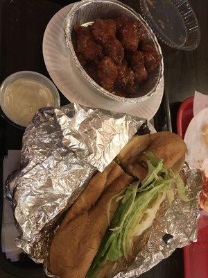 Buffalo Wings and a Cheesesteak.. They don't even chop up the lettuce or fill it up. Gross