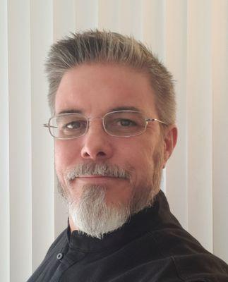 Bryan Reisinger, Owner, Acupuncturist, Massage Therapist