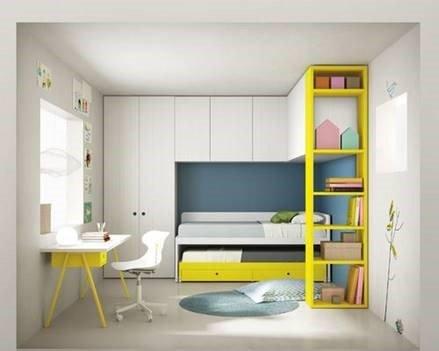 A clean, uncluttered child's room with plenty of built-in storage.