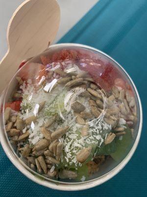 Paradiso Base With honey almond granola, strawberries, kiwi, shredded coconut and sunflower seeds.