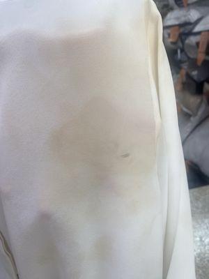 My expensive high end silk blouse came out after the "dry cleaning " stained and ripped