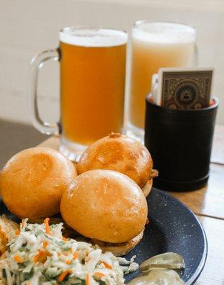 Pork Sliders with sweet lime sesame slaw and kettle chips.