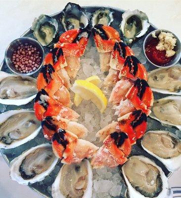 Sampling of oysters and crab claws!