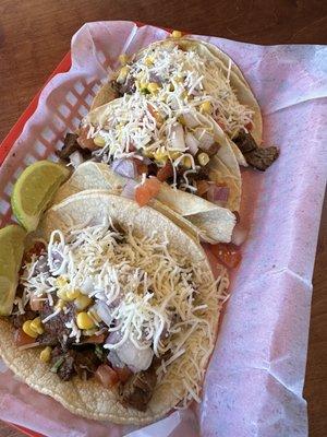 Grilled steak on corn tortillas