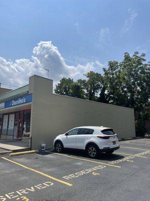 Exterior painting at New York commercial store after work is completed photo