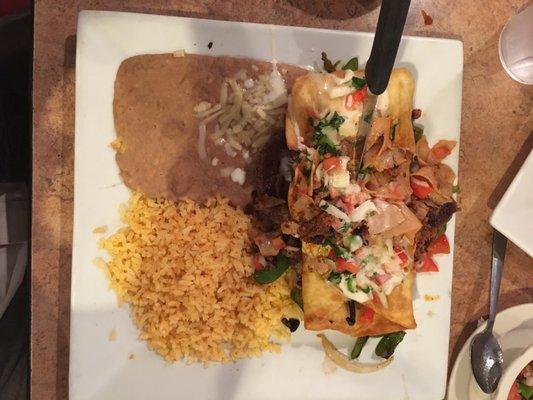 Chile Travieso. A huge portion. Steak under a fried, stuffed poblano.