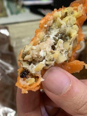 Empanada with fly topping