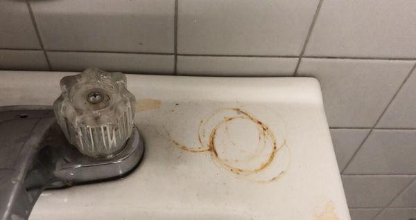 Stain restroom sink