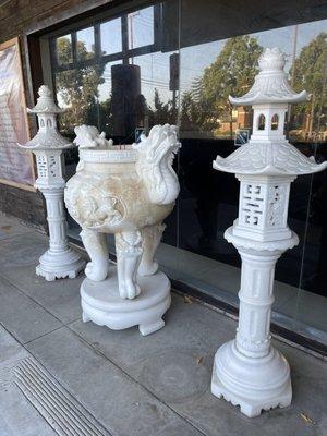 Ornate incense holder and pillars.