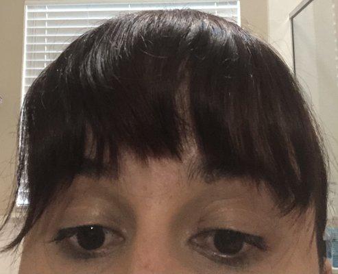 Does that look like professional cut bangs?