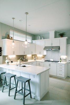 Kitchen designed by Studio H Designs, Inc. with Waypoint Cabinetry