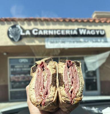 SMOKED WAGYU PASTRAMI: Whole Grain Island Dressing, Sauerkraut, Smoked Mozzarella, Pig Onion Marmalade, Marble Rye | $23