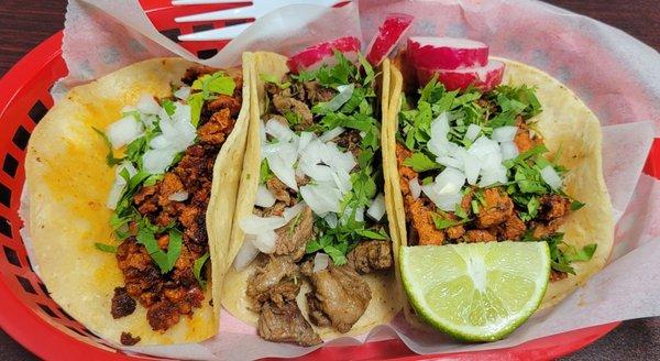 Chorizo, pastor, and Carne Asada tacos....so delicious