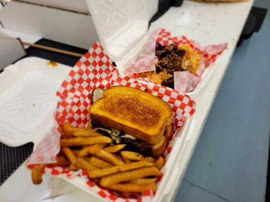 Mac n Cheese with smoked brisket. Brisket sandwich with seasoned fries