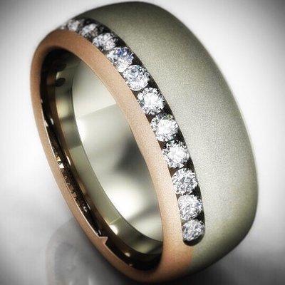 Custom men's band with diamonds, rose gold and white gold. Britten has been creating custom design jewelry in Reno for over 30 years.