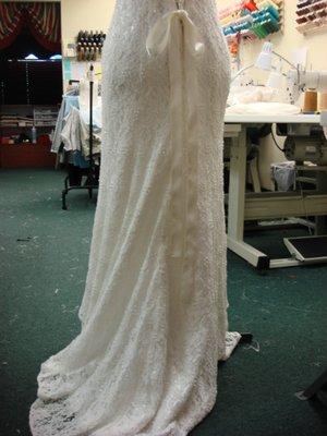 Closeup of lace wedding gown