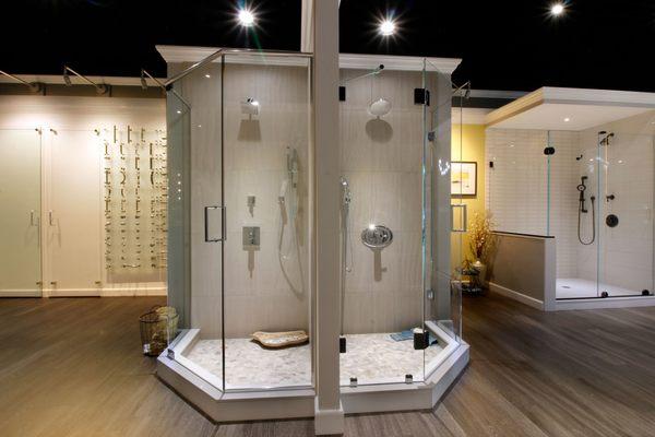 Back-to-back neo-angle shower enclosures allow both headerless and with-header designs to be shown.