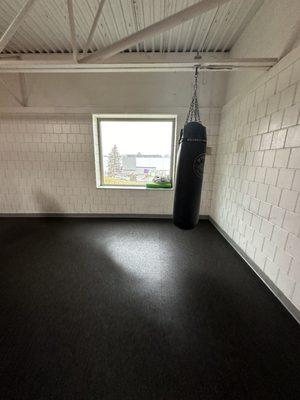 Track window with punching bag