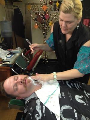 Charlene cleaning up that beard and shaving his neck.