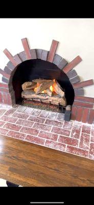 Fireplace with remote control in the front section