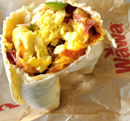 Scrambled egg, bacon, cheese, and salsa burrito