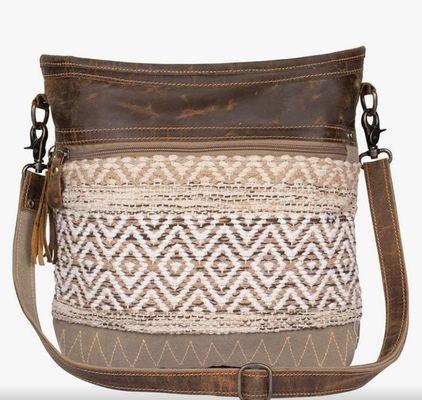 Myra handbags are made of leather and canvas, making this a durable bag.