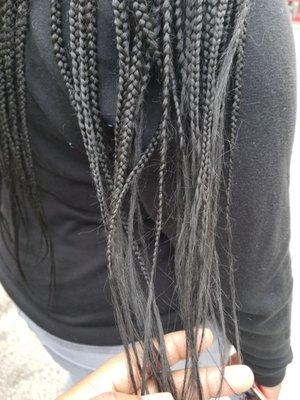 Frizzy ends of tribal braids