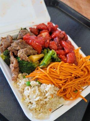 2 item combination (broccoli beef and orange chicken) with half chow mein and half fried rice