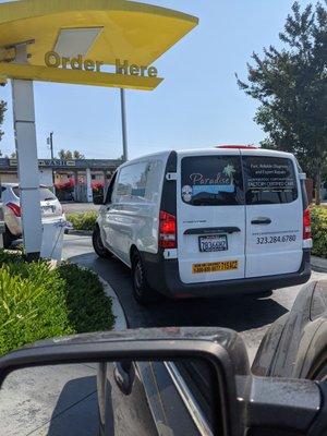 A dick driving a van.