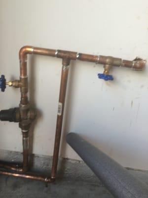 main water shutoff, pressure reducing valve and hose Bibb shutoff reconfigured to meet home inspector/realtor request