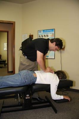 Dr. Troy Norris is versed in many different adjusting techniques such as a manual adjustment.